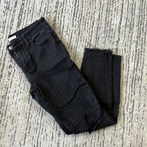 Black mid-rise jeans w slits on knees